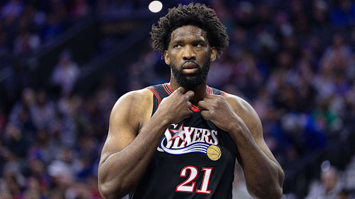 Dec 23, 2025; Philadelphia, Pennsylvania, USA; Philadelphia 76ers center Joel Embiid (21) looks on against the Brooklyn Nets during the first quarter at Xfinity Mobile Arena. Mandatory Credit: Bill Streicher-Imagn Images