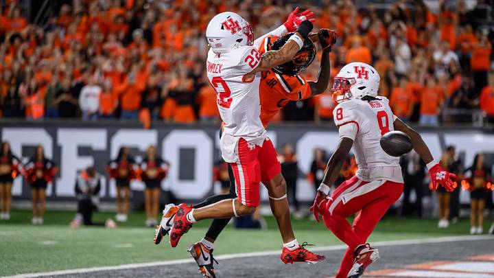 Sep 26, 2025; Corvallis, Oregon, USA; Houston Cougars defensive back Marc Stampley II (22) and defensive back Kentrell Webb (8) break up a pass in the end zone intended for Oregon State Beavers wide receiver David Wells Jr. (1) during the second quarter at Reser Stadium. Mandatory Credit: Craig Strobeck-Imagn Images Sep 26, 2025; Corvallis, Oregon, USA; Houston Cougars defensive back Marc Stampley II (22) and defensive back Kentrell Webb (8) break up a pass in the end zone intended for Oregon State Beavers wide receiver David Wells Jr. (1) during the second quarter at Reser Stadium. Mandatory Credit: Craig Strobeck-Imagn Images