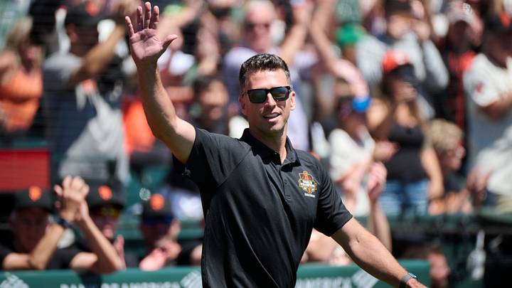 Former San Francisco Giants catcher Buster Posey acknowledges the crowd before a ceremony celebrating the tenth anniversary of the Giants' 2014 World Series championship.  Credit: Robert Edwards-USA TODAY Sports