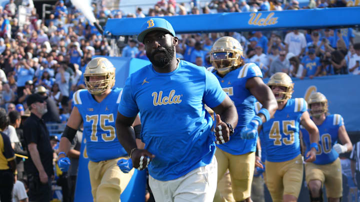 Sep 14, 2024; Pasadena, California, USA; UCLA Bruins head coach DeShaun Foster enters the field before the game against the Indiana Hoosiers at Rose Bowl. Mandatory Credit: Kirby Lee-Imagn Images