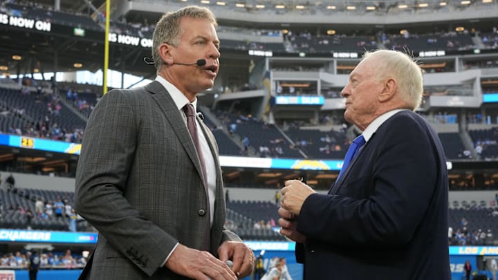 Dallas Cowboys owner Jerry Jones talks with former QB Troy Aikman before the game against the Los Angeles Chargers. Dallas Cowboys owner Jerry Jones talks with former QB Troy Aikman before the game against the Los Angeles Chargers.