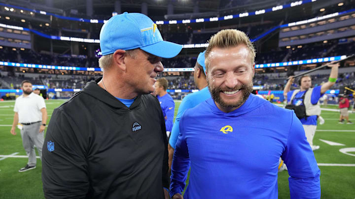 Aug 12, 2023; Inglewood, California, USA; Los Angeles Chargers defensive line coach Giff Smith (left) talks with Los Angeles Rams coach Sean McVay after the game at SoFi Stadium. Mandatory Credit: Kirby Lee-Imagn Images Aug 12, 2023; Inglewood, California, USA; Los Angeles Chargers defensive line coach Giff Smith (left) talks with Los Angeles Rams coach Sean McVay after the game at SoFi Stadium. Mandatory Credit: Kirby Lee-Imagn Images