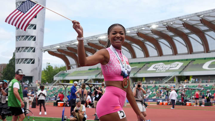 Gabby Thomas takes a victory lap after placing third in the women's 200m during the USATF Championships at Hayward Field.
