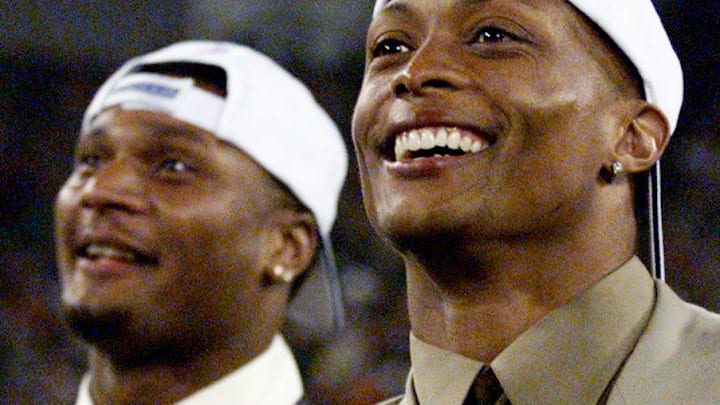 Tennessee Titans Steve McNair, left, and Eddie George look out over the appreciative fans on their arrival at Adelphia Coliseum Jan. 23, 2000 after winning the AFC Championships 33-14 over Jacksonville on the road.

Titan Players