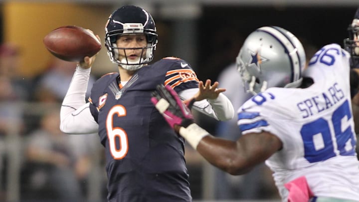 Jay Cutler throws for a touchdown against Dallas in a 2012 game. Jay Cutler throws for a touchdown against Dallas in a 2012 game.