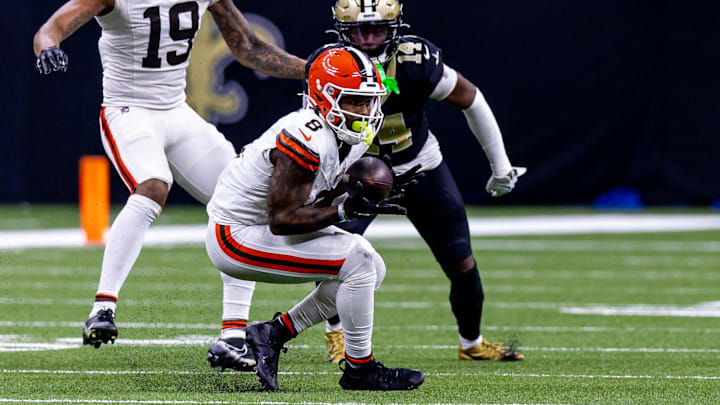 Nov 17, 2024; New Orleans, Louisiana, USA;  Cleveland Browns wide receiver Elijah Moore (8) catches a pass against New Orleans Saints cornerback Kool-Aid McKinstry (14) during the second half at Caesars Superdome. Mandatory Credit: Stephen Lew-Imagn Images
