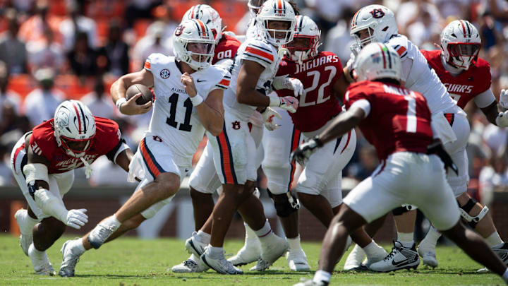 Auburn Tigers quarterback Jackson Arnold (11) runs the ball as Auburn Tigers take on South Alabama Jaguars at Jordan-Hare Stadium in Auburn, Ala. on Saturday, Sept. 13, 2025. Auburn Tigers lead South Alabama Jaguars 28-9 at halftime.