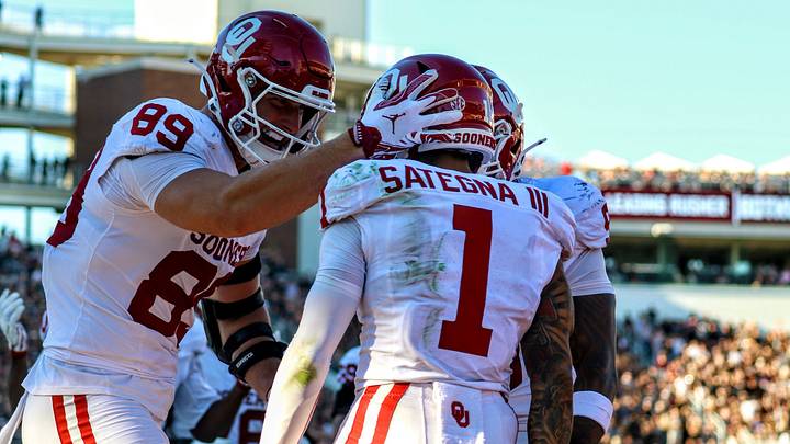 Oklahoma celebrates after Isaiah Sategna scores a touchdown against Mississippi State.