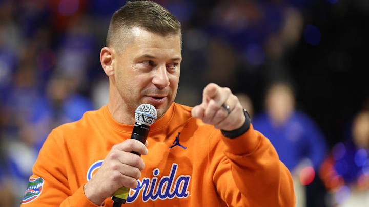 New Gator head football coach Jon Sumrall fires up the crowd during the first half an NCAA basketball game at Steven C. O'Connell Center Exactek arena in Gainesville, FL on Saturday, January 24, 2026. Auburn won 76-67 [Alan Youngblood/Gainesville Sun]