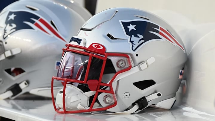 Aug 19, 2022; Foxborough, Massachusetts, USA; A Patriots helmet sits on the bench before the first half of a preseason game against the Carolina Panthers at Gillette Stadium. Mandatory Credit: Eric Canha-Imagn Images