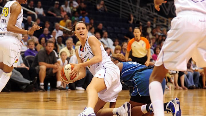 June 10, 2010; Phoenix, AZ, USA; Phoenix Mercury forward Penny Taylor grabs a loose ball during the first half against the Minnesota Lynx at US Airways Center.  Mandatory Credit: Jennifer Stewart-Imagn Images