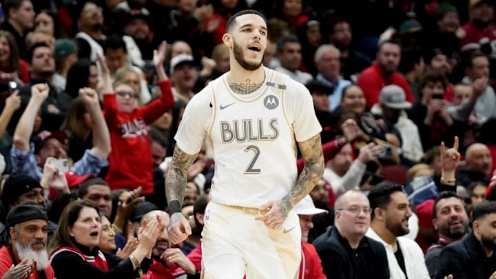 Jan 4, 2025; Chicago, Illinois, USA; Chicago Bulls guard Lonzo Ball (2) reacts after making a three point basket against the New York Knicks during the second half at United Center. Mandatory Credit: David Banks-Imagn Images