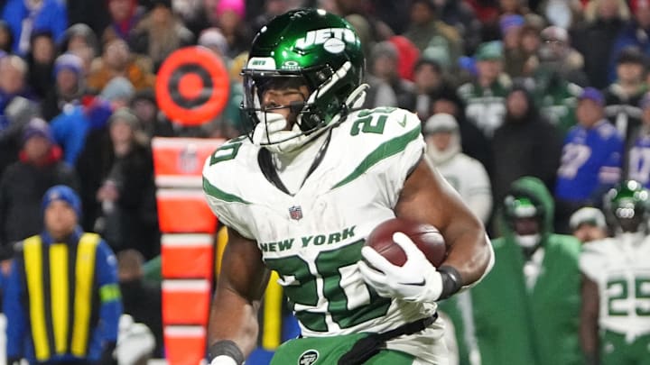 Nov 19, 2023; Orchard Park, New York, USA; New York Jets running back Breece Hall (20) runs with the ball against the Buffalo Bills during the second half at Highmark Stadium.