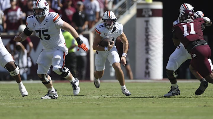 Sep 27, 2025; College Station, Texas, USA; Auburn Tigers quarterback Jackson Arnold (11) runs with the ball during the first quarter against the Texas A&M Aggies at Kyle Field. Mandatory Credit: Troy Taormina-Imagn Images
