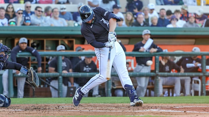 Mar 21, 2025; Lakeland, Florida, USA; Detroit Tigers first baseman Spencer Torkelson (20) hits during the second inning against the New York Yankees at Publix Field at Joker Marchant Stadium. 