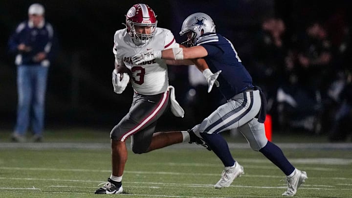 Farragut's Harrison Smith (1) tackles Oak Ridge's Malik Howard (3) during a TSSAA high school football game between Farragut and Oak Ridge High School on Oct. 23, 2025.
