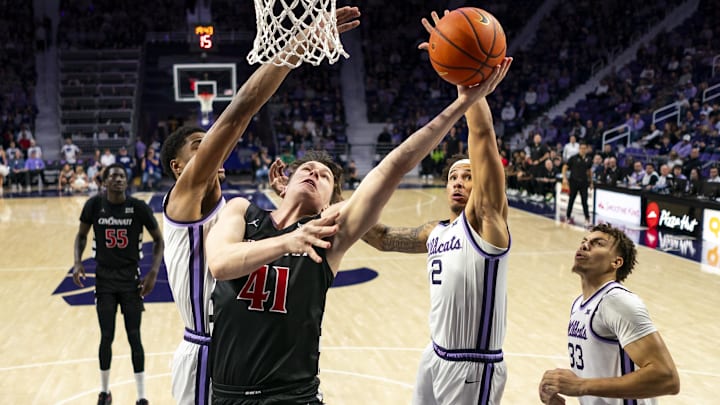 Dec 30, 2024; Manhattan, Kansas, USA; Cincinnati Bearcats guard Simas Lukosius (41) shoots during the first half against the Kansas State Wildcats at Bramlage Coliseum. Mandatory Credit: Jay Biggerstaff-Imagn Images Dec 30, 2024; Manhattan, Kansas, USA; Cincinnati Bearcats guard Simas Lukosius (41) shoots during the first half against the Kansas State Wildcats at Bramlage Coliseum. Mandatory Credit: Jay Biggerstaff-Imagn Images