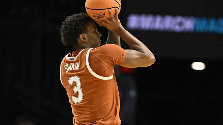 Mar 19, 2026; Portland, OR, USA; Texas Longhorns forward Dailyn Swain (3) shoots in the first half against the BYU Cougars during a first-round game of the men's 2026 NCAA Tournament. Mar 19, 2026; Portland, OR, USA; Texas Longhorns forward Dailyn Swain (3) shoots in the first half against the BYU Cougars during a first-round game of the men's 2026 NCAA Tournament.