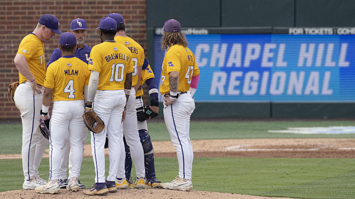 Jun 3, 2024; Chapel Hill, NC, USA;  The Louisiana State Tigers huddle on the mound during the second inning of the Div. I NCAA baseball regional against the North Carolina Tar Heels at Boshamer Stadium.  Mandatory Credit: Jeffrey Camarati-Imagn Images
