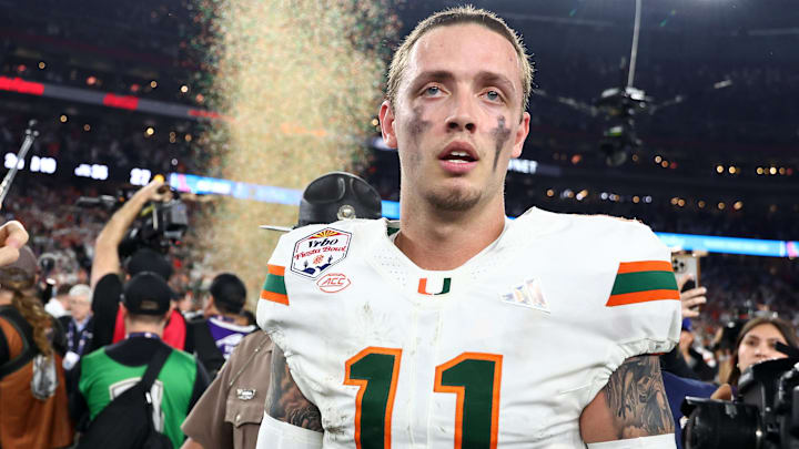 Jan 8, 2026; Glendale, AZ, USA; Miami Hurricanes quarterback Carson Beck (11) reacts after winning the 2026 Fiesta Bowl and semifinal game of the College Football Playoff at State Farm Stadium.