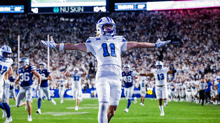 BYU punt returner Parker Kingston returns a punt for a touchdown against Kansas State