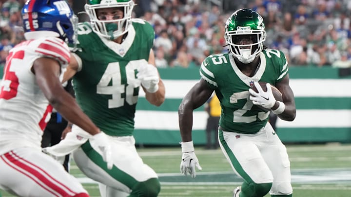 East Rutherford, NJ -- August 24, 2024 -- Israel Abanikanda of the Jets runs the ball in the first half. The New York Giants and New York Jets meet at MetLife Stadium in the final preseason game of the 2024 season for both teams.