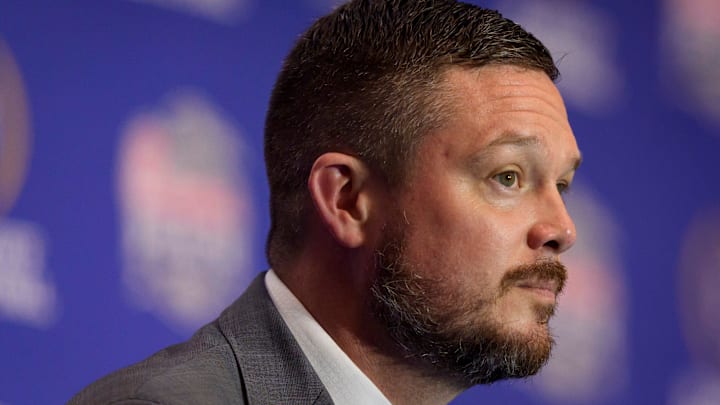 Oregon head coach Dan Lanning listens to a reporter’s question during the head coaches’ press conference ahead of the Peach Bowl at the College Football Hall of Fame in Atlanta, Georgia, on Jan. 8, 2026.