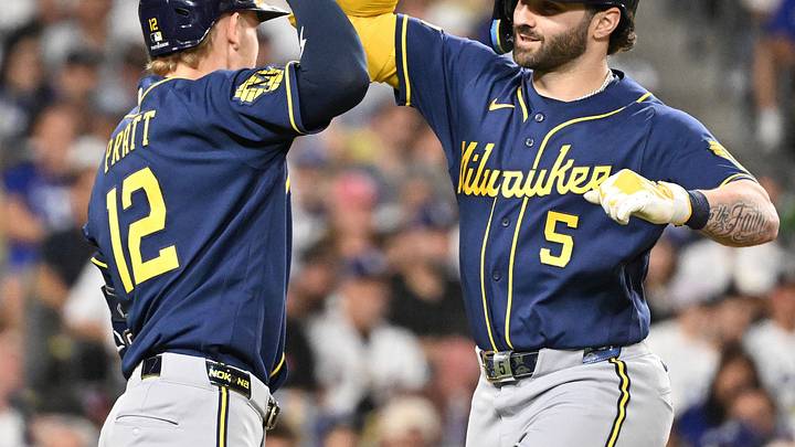 Brewers outfielder Garrett Mitchell (right) hit the game-winning home run in Game 4 of the NLCS.