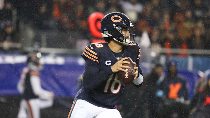 Dec 26, 2024; Chicago, Illinois, USA; Chicago Bears quarterback Caleb Williams (18) rolls out of the pocket during the third quarter against the Seattle Seahawks at Soldier Field. Mandatory Credit: Talia Sprague-Imagn Images