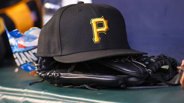 Sep 8, 2023; Atlanta, Georgia, USA; A detailed view of a Pittsburgh Pirates hat and glove before a game against the Pittsburgh Pirates in the first inning at Truist Park. Mandatory Credit: Brett Davis-Imagn Images