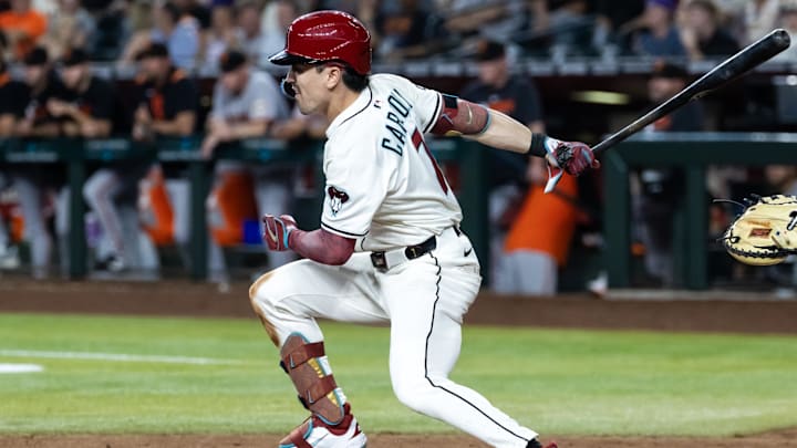 Arizona Diamondbacks outfielder Corbin Carroll hits a ninth inning single against the San Francisco Giants at Chase Field. Arizona Diamondbacks outfielder Corbin Carroll hits a ninth inning single against the San Francisco Giants at Chase Field.