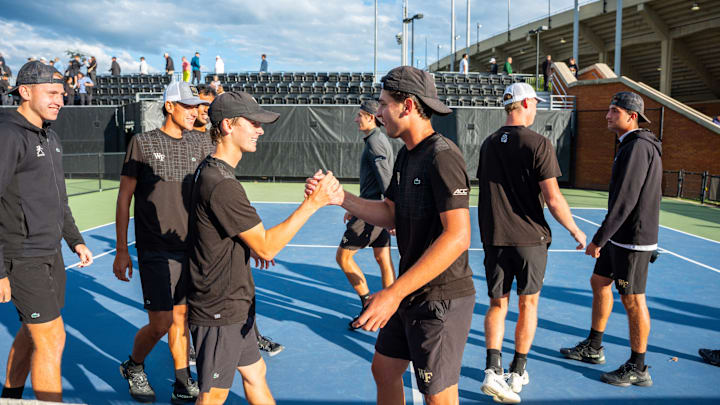 Wake Forest men's tennis team celebrates after defeating Old Dominion in the NCAA Tournament 