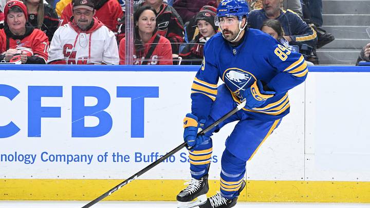Nov 23, 2025; Buffalo, New York, USA; Buffalo Sabres right wing Alex Tuch (89) handles the puck in the second period against the Carolina Hurricanes at KeyBank Center. Mandatory Credit: Mark Konezny-Imagn Images
