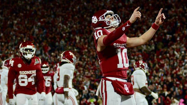 Oklahoma quarterback John Mateer celebrates after a touchdown against Alabama in the CFP.