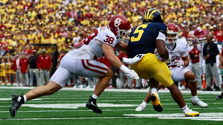 Oklahoma linebacker Owen Heinecke tackles Michigan running back Savion Hiter in the first half at The Big House. Oklahoma linebacker Owen Heinecke tackles Michigan running back Savion Hiter in the first half at The Big House.