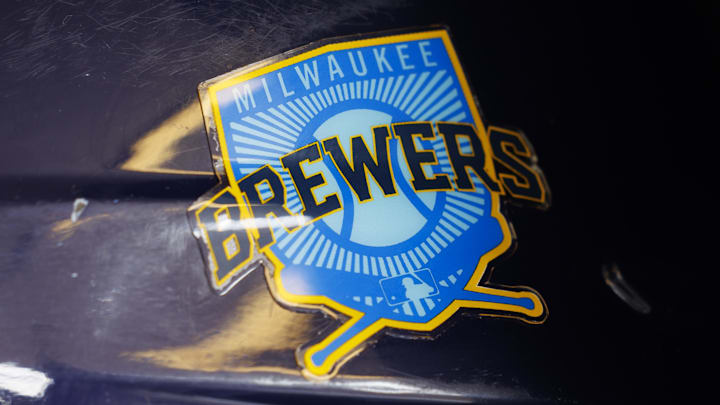 Jun 18, 2023; Milwaukee, Wisconsin, USA; A Milwaukee Brewers logo on a batting helmet in the dugout prior to the game against the Pittsburgh Pirates at American Family Field. Mandatory Credit: Jeff Hanisch-Imagn Images Jun 18, 2023; Milwaukee, Wisconsin, USA; A Milwaukee Brewers logo on a batting helmet in the dugout prior to the game against the Pittsburgh Pirates at American Family Field. Mandatory Credit: Jeff Hanisch-Imagn Images