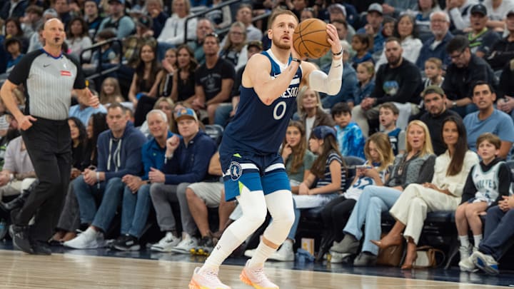 Minnesota Timberwolves guard Donte DiVincenzo shoots a 3-pointer against the Utah Jazz in the first quarter at Target Center in Minneapolis on April 13, 2025. Minnesota Timberwolves guard Donte DiVincenzo shoots a 3-pointer against the Utah Jazz in the first quarter at Target Center in Minneapolis on April 13, 2025.