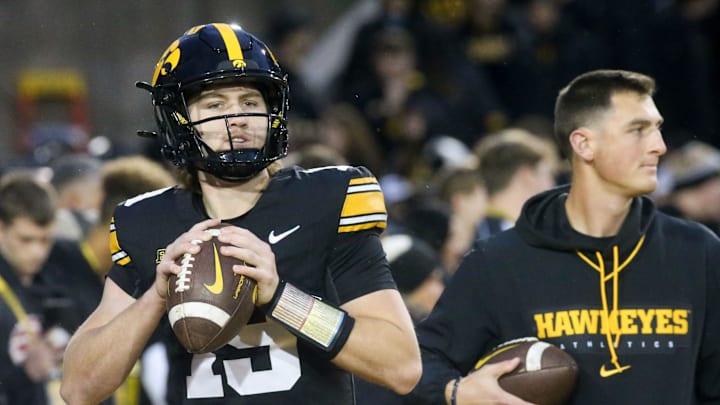 Iowa Hawkeyes backup quarterback Jackson Stratton (19) warms up before playing Wisconsin Saturday, Nov. 2, 2024 at Kinnick Stadium in Iowa City, Iowa.