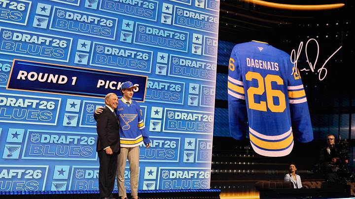 Jun 26, 2026; Buffalo, New York, USA; Maddox Dagenais reacts beside NHL commissioner Gary Bettman after being selected with the sixteenth pick in the first round of the 2026 NHL Draft by the St. Louis Blues at KeyBank Center. Mandatory Credit: Timothy T. Ludwig-Imagn Images