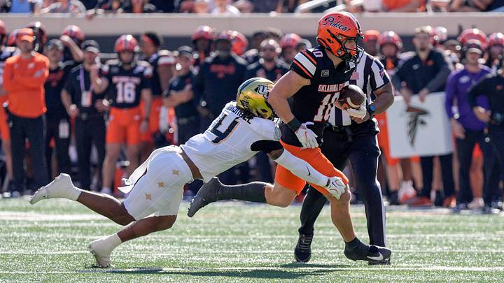 OSU wide receiver Wyatt Young (10) runs the ball and is taken down by UCF defensive back Braeden Marshall (4) in the first quarter during an NCAA football game between the Oklahoma State University (OSU) Cowboys and the University of Central Florida (UCF) Knights at Boone Pickens Stadium in Stillwater, Okla., on Saturday, Oct. 10, 2026. OSU wide receiver Wyatt Young (10) runs the ball and is taken down by UCF defensive back Braeden Marshall (4) in the first quarter during an NCAA football game between the Oklahoma State University (OSU) Cowboys and the University of Central Florida (UCF) Knights at Boone Pickens Stadium in Stillwater, Okla., on Saturday, Oct. 10, 2026.