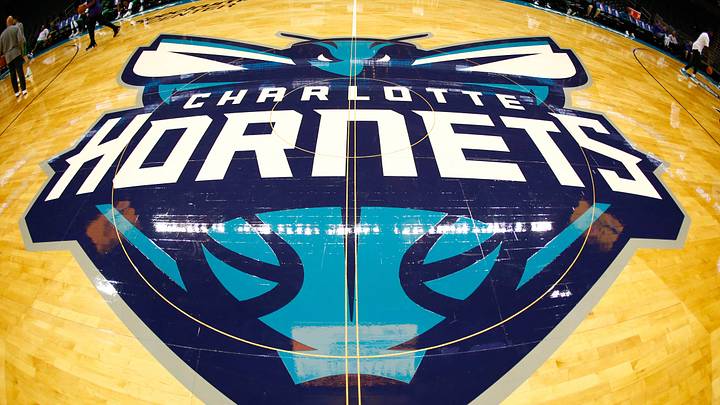 Oct 11, 2017; Charlotte, NC, USA; A view of the Charlotte Hornets logo at half court prior to the game against the Boston Celtics at Spectrum Center. Mandatory Credit: Jeremy Brevard-USA TODAY Sports Oct 11, 2017; Charlotte, NC, USA; A view of the Charlotte Hornets logo at half court prior to the game against the Boston Celtics at Spectrum Center. Mandatory Credit: Jeremy Brevard-USA TODAY Sports
