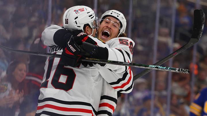 Oct 3, 2026; Buffalo, New York, USA;  Chicago Blackhawks left wing Tyler Bertuzzi (59) celebrates his goal with center Anton Frondell (16) during the first period against the Buffalo Sabres at KeyBank Center. Mandatory Credit: Timothy T. Ludwig-Imagn Images