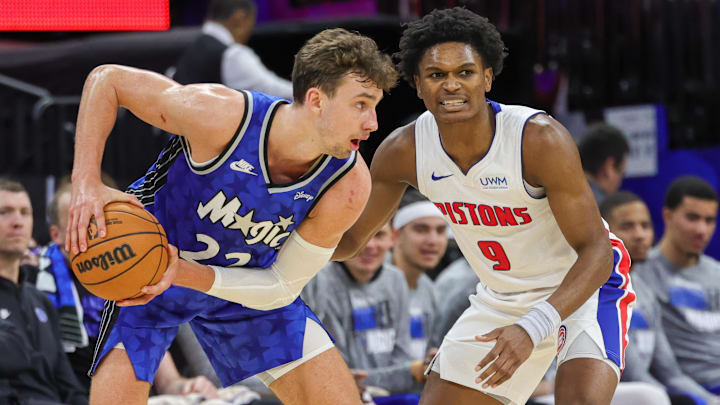 Mar 3, 2024; Orlando, Florida, USA; Detroit Pistons forward Ausar Thompson (9) defends Orlando Magic forward Franz Wagner (22) during the second half at KIA Center. Mandatory Credit: Mike Watters-Imagn Images