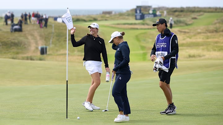 Mimi Rhodes of England celebrates a hole in one on the 5th hole during the final round of the 2025 AIG Women's Open at Royal Porthcawl in Wales.