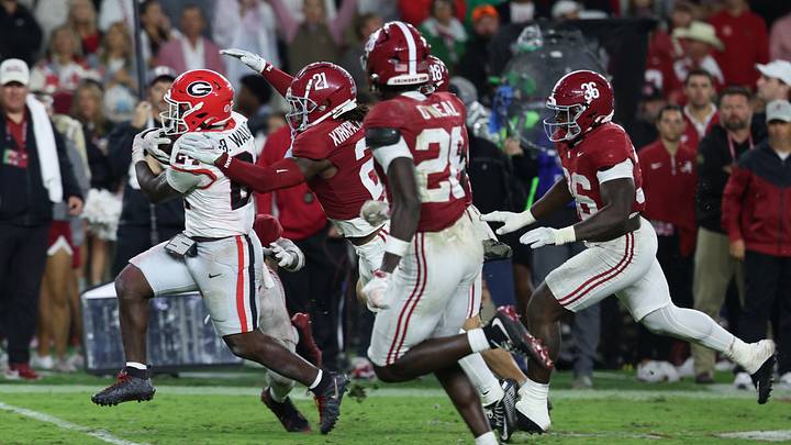 Oct 10, 2026; Tuscaloosa, Alabama, USA; Georgia Bulldogs running back Bo Walker (24) carries the ball defended by Alabama Crimson Tide defensive back Dre Kirkpatrick Jr. (21) during the fourth quarter at Saban Field at Bryant-Denny Stadium. Mandatory Credit: David Leong-Imagn Images Oct 10, 2026; Tuscaloosa, Alabama, USA; Georgia Bulldogs running back Bo Walker (24) carries the ball defended by Alabama Crimson Tide defensive back Dre Kirkpatrick Jr. (21) during the fourth quarter at Saban Field at Bryant-Denny Stadium. Mandatory Credit: David Leong-Imagn Images