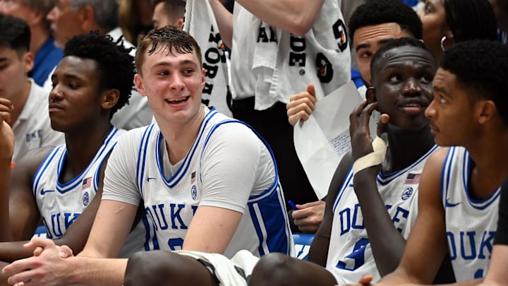Feb 12, 2025; Durham, North Carolina, USA;Duke Blue Devils forward Cooper Flagg (2) reacts on the bench during the second half against the California Golden Bears at Cameron Indoor Stadium. Mandatory Credit: Rob Kinnan-Imagn Images