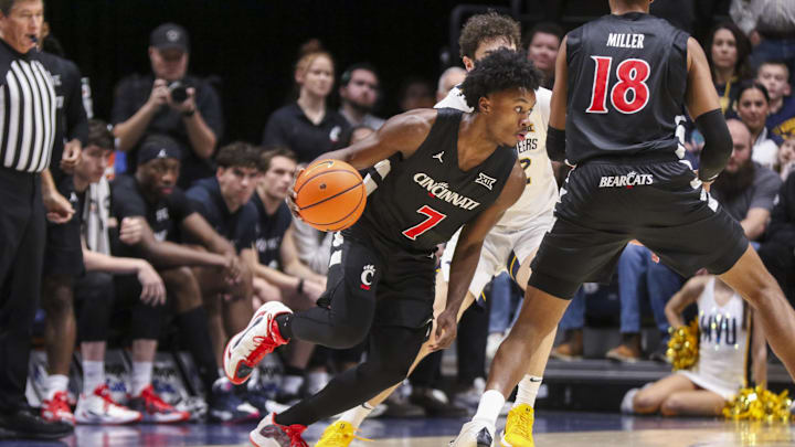 Jan 6, 2026; Morgantown, West Virginia, USA; Cincinnati Bearcats guard Keyshuan Tillery (7) dribbles during the second half against the West Virginia Mountaineers at Hope Coliseum. Mandatory Credit: Ben Queen-Imagn Images