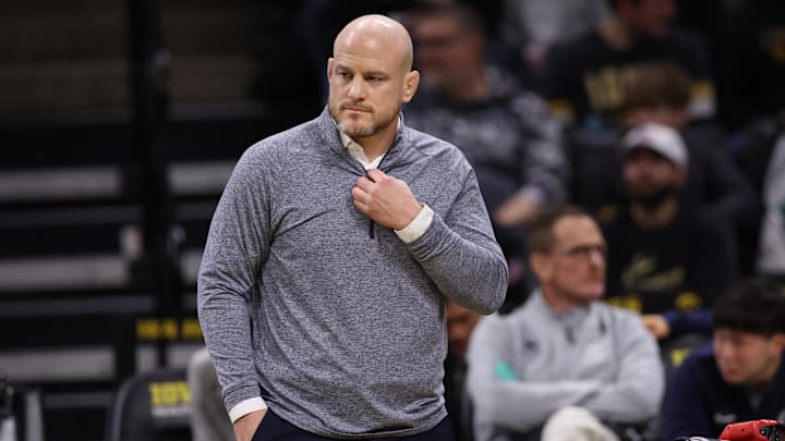 Penn State Nittany Lions wrestling coach Cael Sanderson watches his team wrestle the Iowa Hawkeyes at Carver-Hawkeye Arena. 