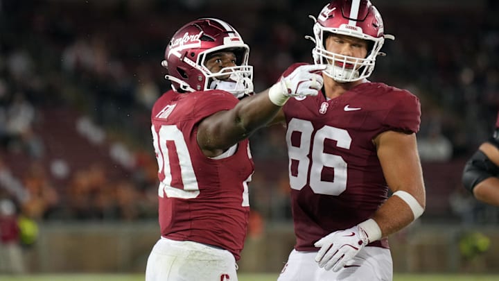 Sep 13, 2025; Stanford, California, USA; Stanford Cardinal running back Micah Ford (left) gestures with tight end Sam Roush (86) after carrying the ball for a first down against the Boston College Eagles during the fourth quarter at Stanford Stadium. Mandatory Credit: Darren Yamashita-Imagn Images Sep 13, 2025; Stanford, California, USA; Stanford Cardinal running back Micah Ford (left) gestures with tight end Sam Roush (86) after carrying the ball for a first down against the Boston College Eagles during the fourth quarter at Stanford Stadium. Mandatory Credit: Darren Yamashita-Imagn Images
