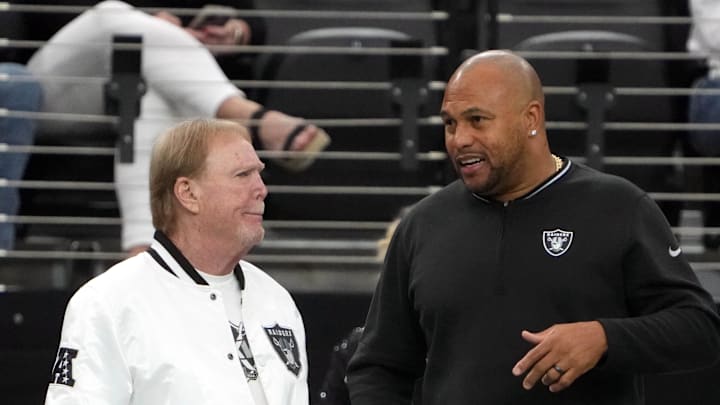 Nov 24, 2024; Paradise, Nevada, USA; Las Vegas Raiders owner Mark Davis (left) talks with coach Antonio Pierce duirng the game against the Denver Broncos at Allegiant Stadium. Mandatory Credit: Kirby Lee-Imagn Images